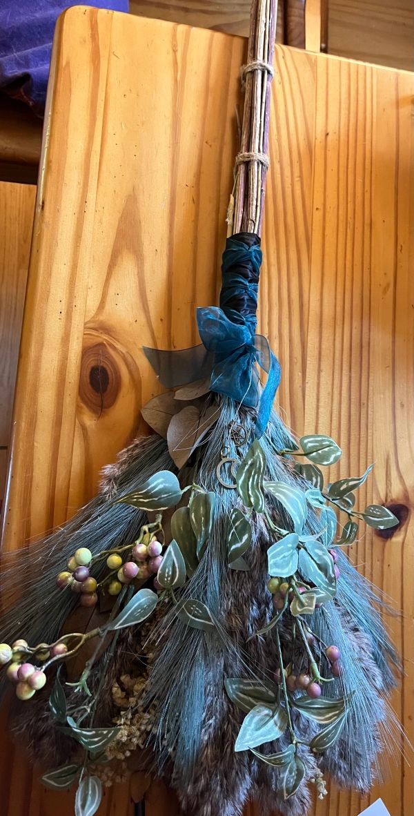 A handcrafted broom to add to your fall decor.