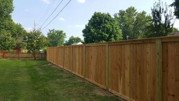 custom cedar cap and trim fence