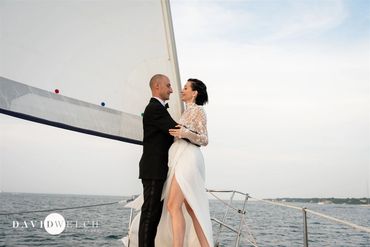 Wedding couple aboard Phoenix during a sunset sail in Vineyard Haven.