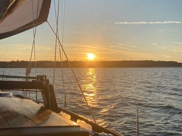 The sun setting over West Tisbury on a Martha's Vineyard sunset sail.