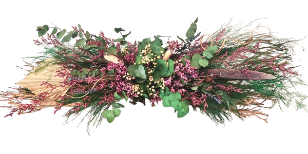 Preserved arrangement with eucalyptus pink and white flowers and branches designed as a centerpiece