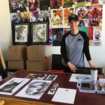 Pencil drawing artist, portrait artist, comic artist Jessica Archer at Heroes world comic shop