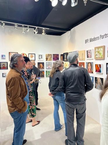 art gallery exhibition viewing featuring portrait art from Jessica archer artworks