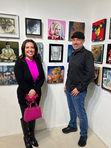 group art exhibit featuring portrait art of Stan lee by pencil artist Jessica archer artworks