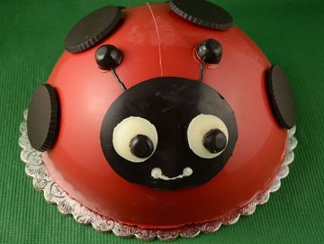 Breakable ladybug chocolate piñata filled with candy to smash open to reveal the goodies inside.