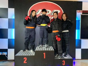 Family enjoying participating in karting with their children at JDR Karting Gloucester