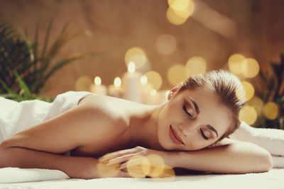 Relaxed and smiling woman having massage