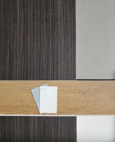 Modern design with wood-look vinyl flooring, soft-close cabinetry, gray quartz countertops