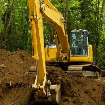 Excavator digging dirt