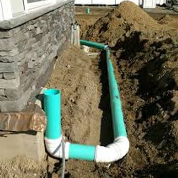 Installing drainage for gutter spouts