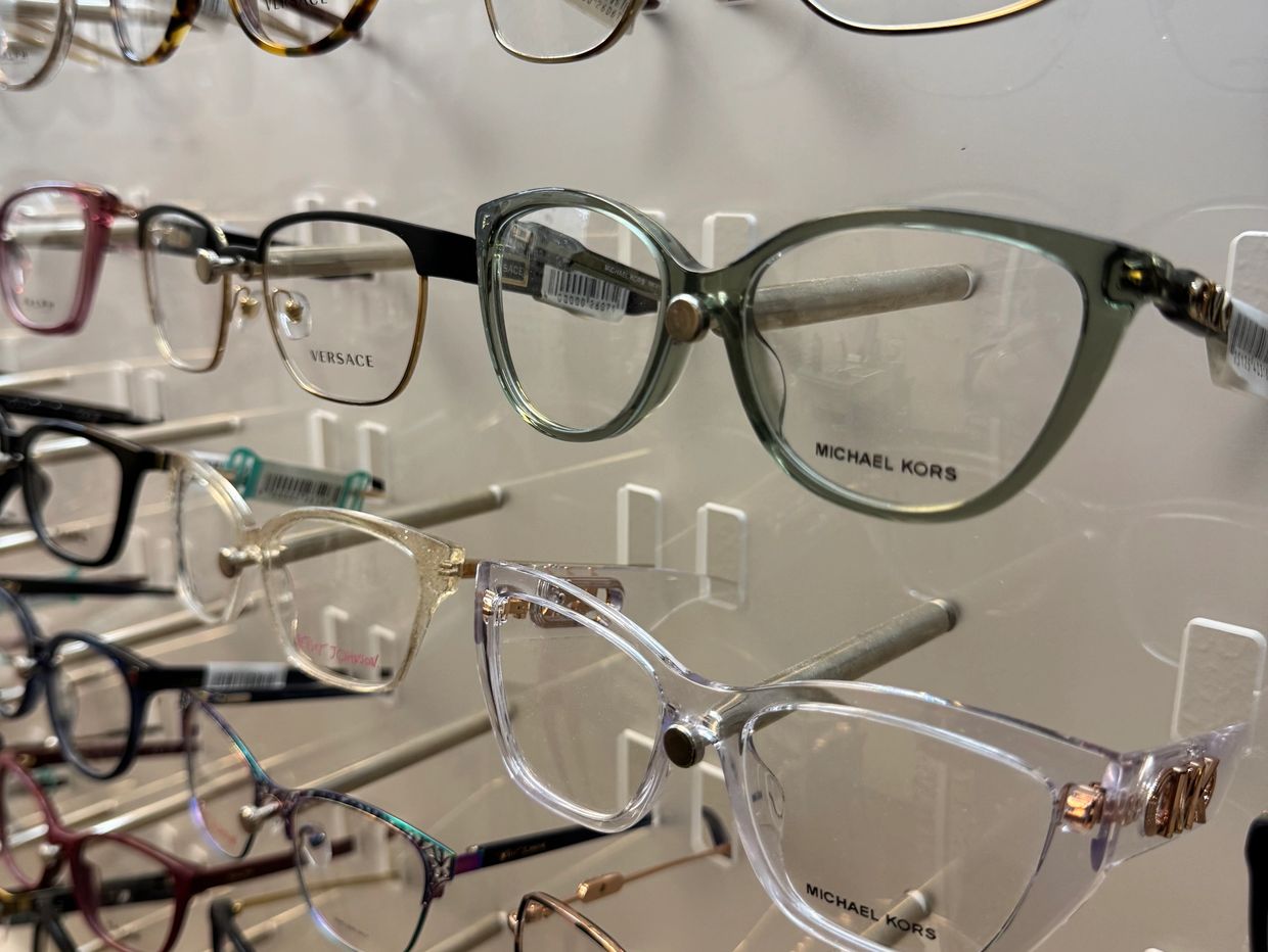 Display of designer eyeglasses in a store.