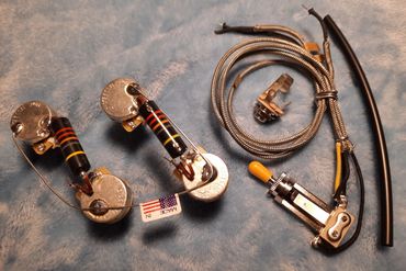 Les Paul wiring package includes wiring harness and Switchcraft toggle switch and output jack.
