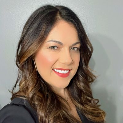 Jene, Certified Light Therapist and founder of SG Light Therapy Lounge in Snohomish, WA, smiling
