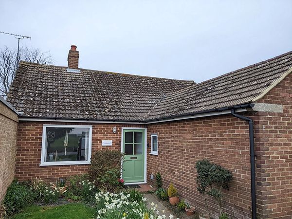Before image of a roof steam cleaning job in Ash, Canterbury.
