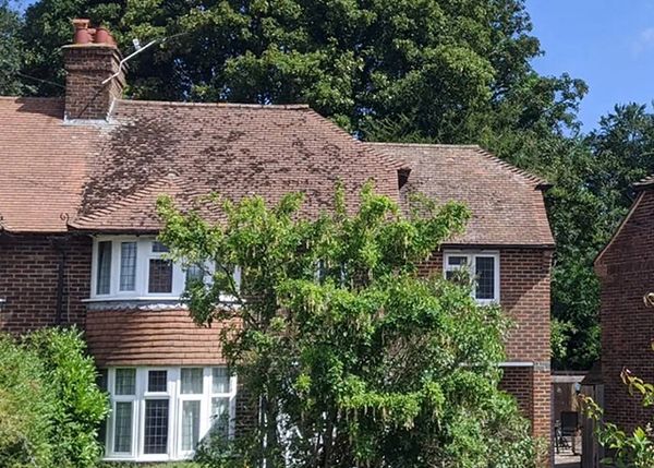 Before of a roof scraping job in Canterbury, Kent UK.