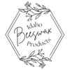 Hexagonal logo with floral accents for Idaho Beeswax Products.