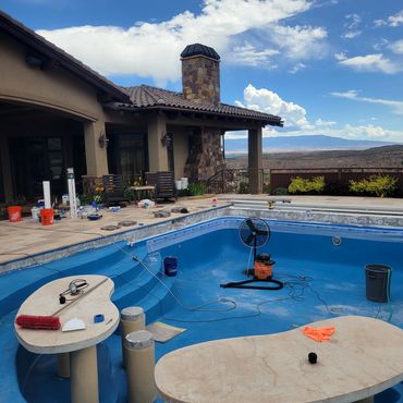 ROCK INSTALL ON POOL OUTLINE + SEATING AREA