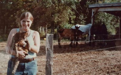 Ruth A. De Gennaro  with mares &  mule foals at one of the sheltered feed stations age 14
