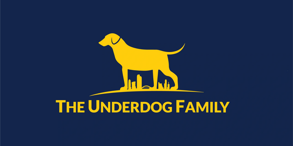 Logo featuring a yellow dog, a cityscape, and the words "The Underdog Family".
