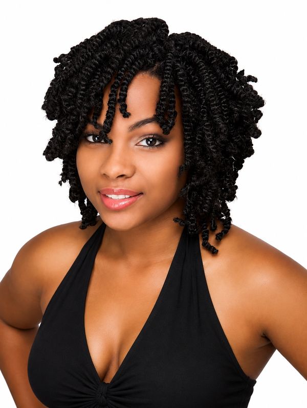 Woman with curly black hair and black halter top.