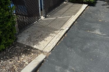 Clean dumpster pad