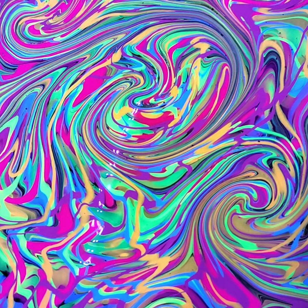 Vivid psychedelic swirls of neon colors creating a mesmerizing abstract pattern.