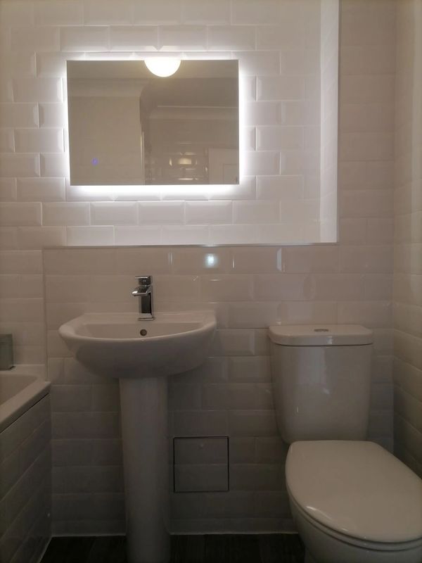 Expertly crafted bathroom on a cheap budget. White metro tiles seamlessly installed.