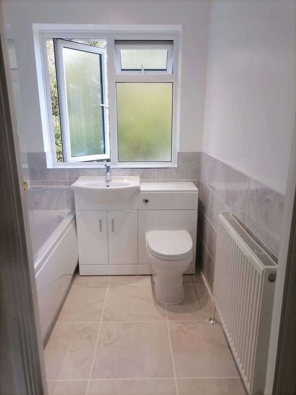 Bathroom renovation with vanity toilet and basin. quality ceramic tiles from CTD Dorking.