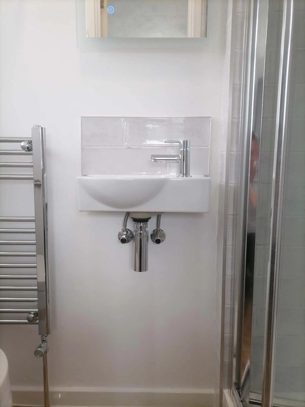 EnSite space saving basin complete with chrome fittings to  achieve a high end look on a budget.