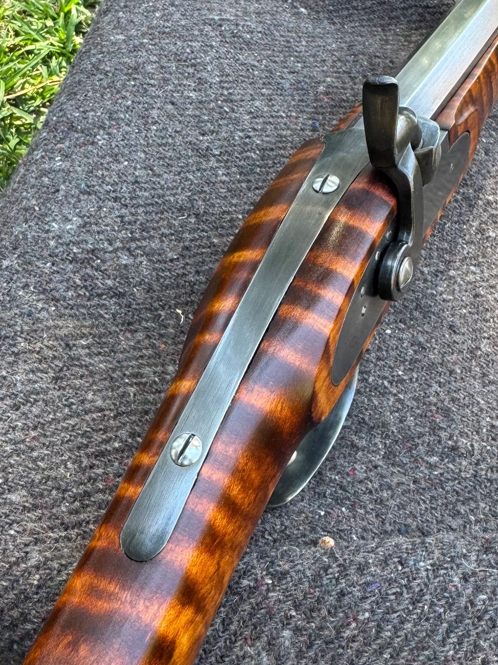 View of full length hooked breechplug and tang