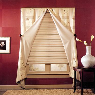 Shade and curtain over a window