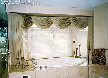 Cream colored window draperies