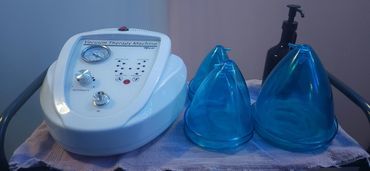Medical suction device with blue cups.