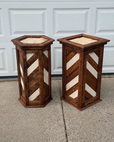 2 custom taxidermy pedestals with chevron pattern for game mounts.