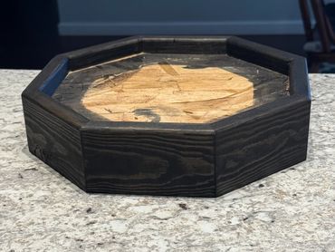 Small octagon base built of pine and stained black, Built by Nichols Taxidermy Bases