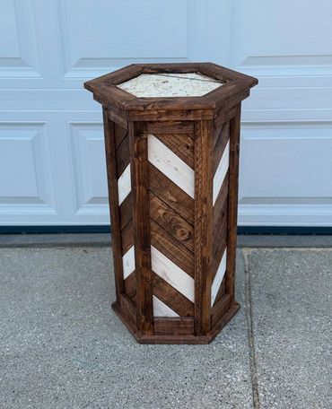 Custom chevron patterned taxidermy pedestal for game mount.