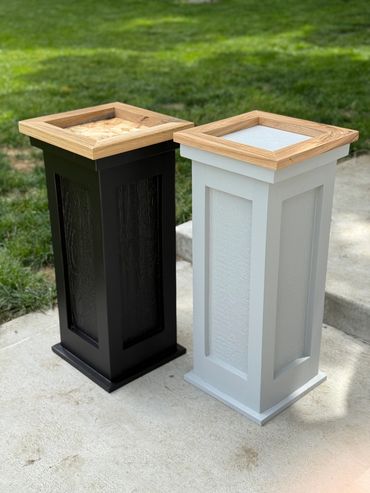 Modern black and white taxidermy pedestal with natural wood tops, handmade for trophy game mounts