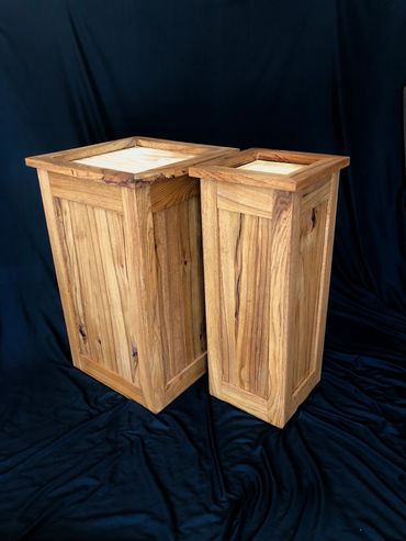 Pair of handcrafted walnut taxidermy pedestals with recessed tops, ideal for shoulder mounts.