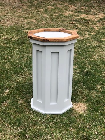 Gray modern octagon pedestal with hardwood top. Built by Nichols Taxidermy Bases.