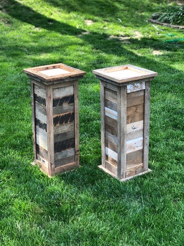 2 square barnwood pedestals with unique pattern, meant for shoulder mount animal.