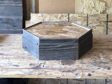 Short hexagon taxidermy base built of reclaimed barn siding. Built by Nichols Taxidermy Bases.