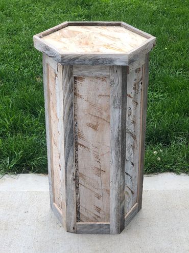 White washed rustic pedestal in a hexagon shape. Built by Nichols Taxidermy Bases.