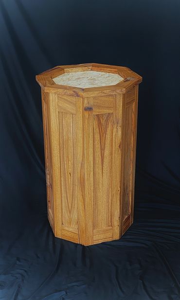 Hardwood octagon pedestal built by Nichols Taxidermy Bases