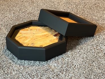 Matte black octagon and square bird bases built by Nichols Taxidermy Bases