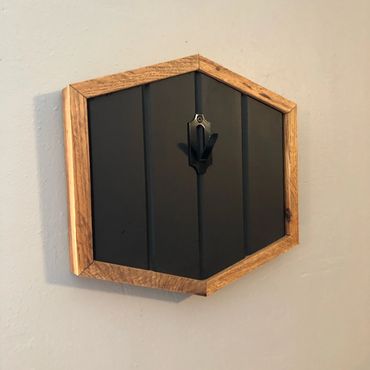 Hexagon black and brown plaques for deer and antelope mounts.