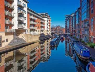 Amazing view on canal network with boats and apartments