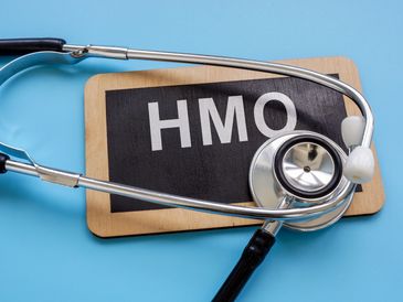 Plate with an inscription Health Maintenance Organization