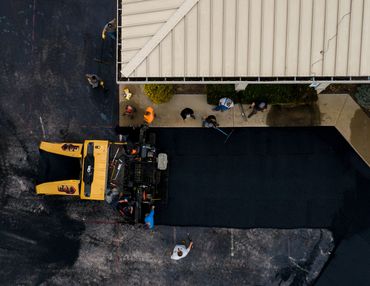 Paving parking lot with paver