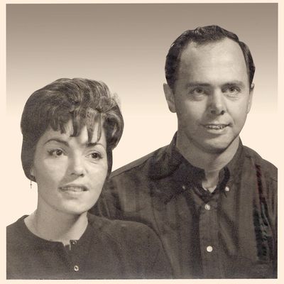 A vintage black-and-white portrait of a man and woman.