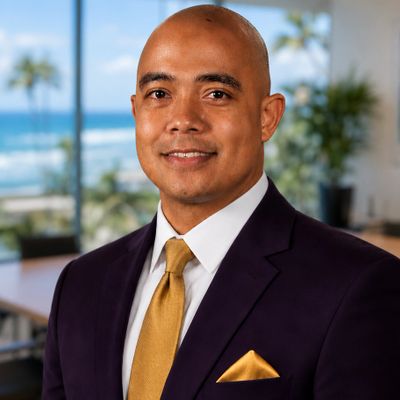 Professional man in suit with ocean view background.